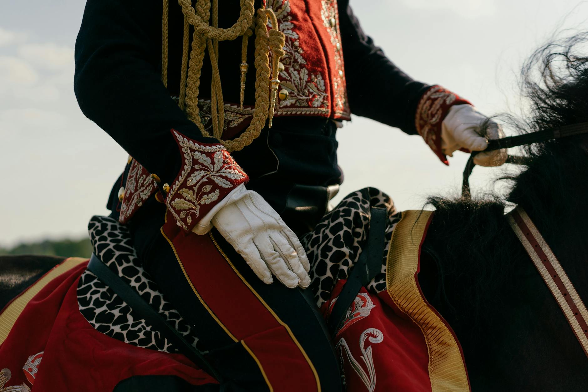 a horseman riding on black horse